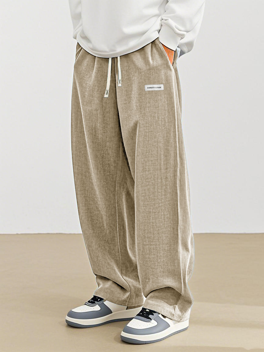 Men's Fashion Casual Everyday Hemp Fabric Pocket Embroidered Logo Loose Trousers