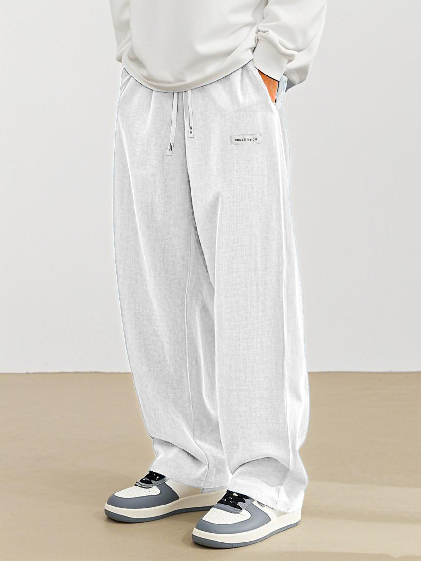 Men's Fashion Casual Everyday Hemp Fabric Pocket Embroidered Logo Loose Trousers