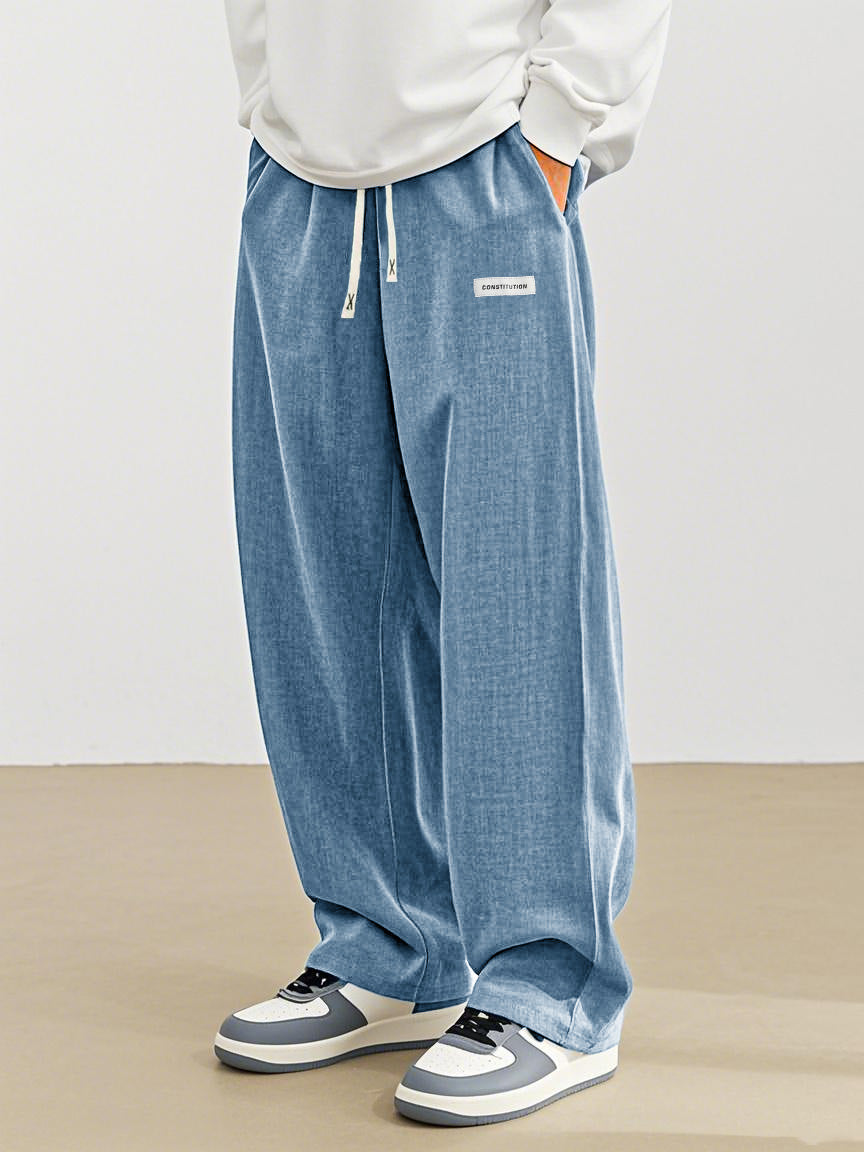 Men's Fashion Casual Everyday Hemp Fabric Pocket Embroidered Logo Loose Trousers